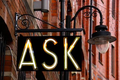 sign with light that says "ask"