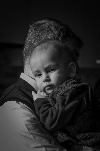 b&w photo of father and child